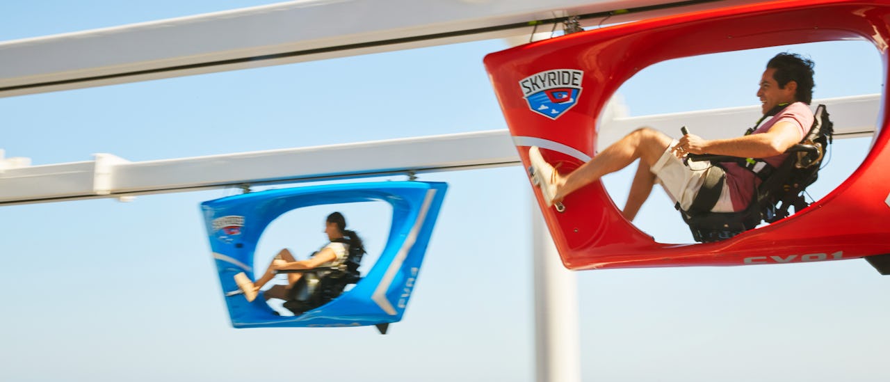 Sky-ride: a pedal operated vehicle that travels along the sport & activity deck